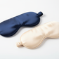 1 navy blue colour satin eye mask and 1 cream colour satin eye mask