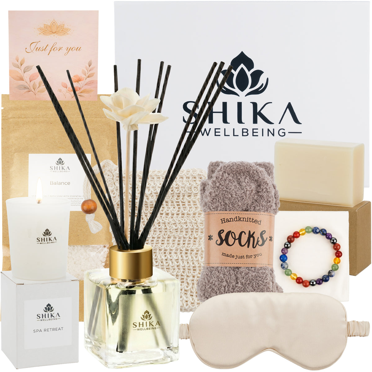 Shika Wellbeing gift set with diffuser, candle, socks, and eye mask.