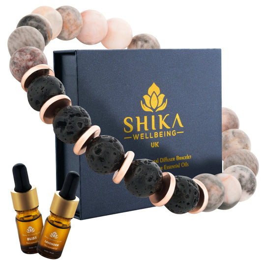 Whether you're facing a hectic day or seeking a moment of respite, this gift set provides the perfect solution. Simply apply a few drops of bliss and lavender oil to the lava stone beads and let the soothing scent envelop you in comfort.  calming gifts for women shika bracelet scilla rose bracelet love wellness rose quartz jewellery for women  peace and calming essential oil scented bracelet crystal bracelets for women unique present
