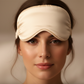 female model wearing cream satin eye mask